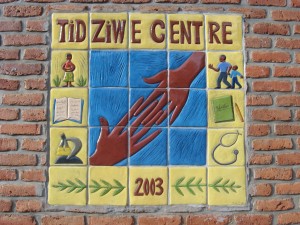 Custom-made ceramic tiles greet visitors to the Tidziwe Center